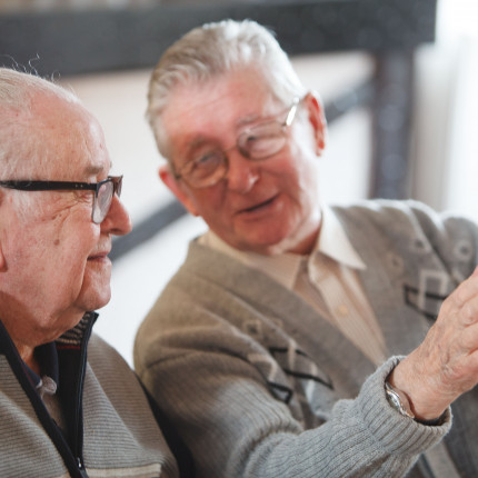 Two veterans chat together at Kirkcaldy lunch club