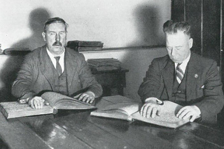 Blind veterans reading braille at Linburn House