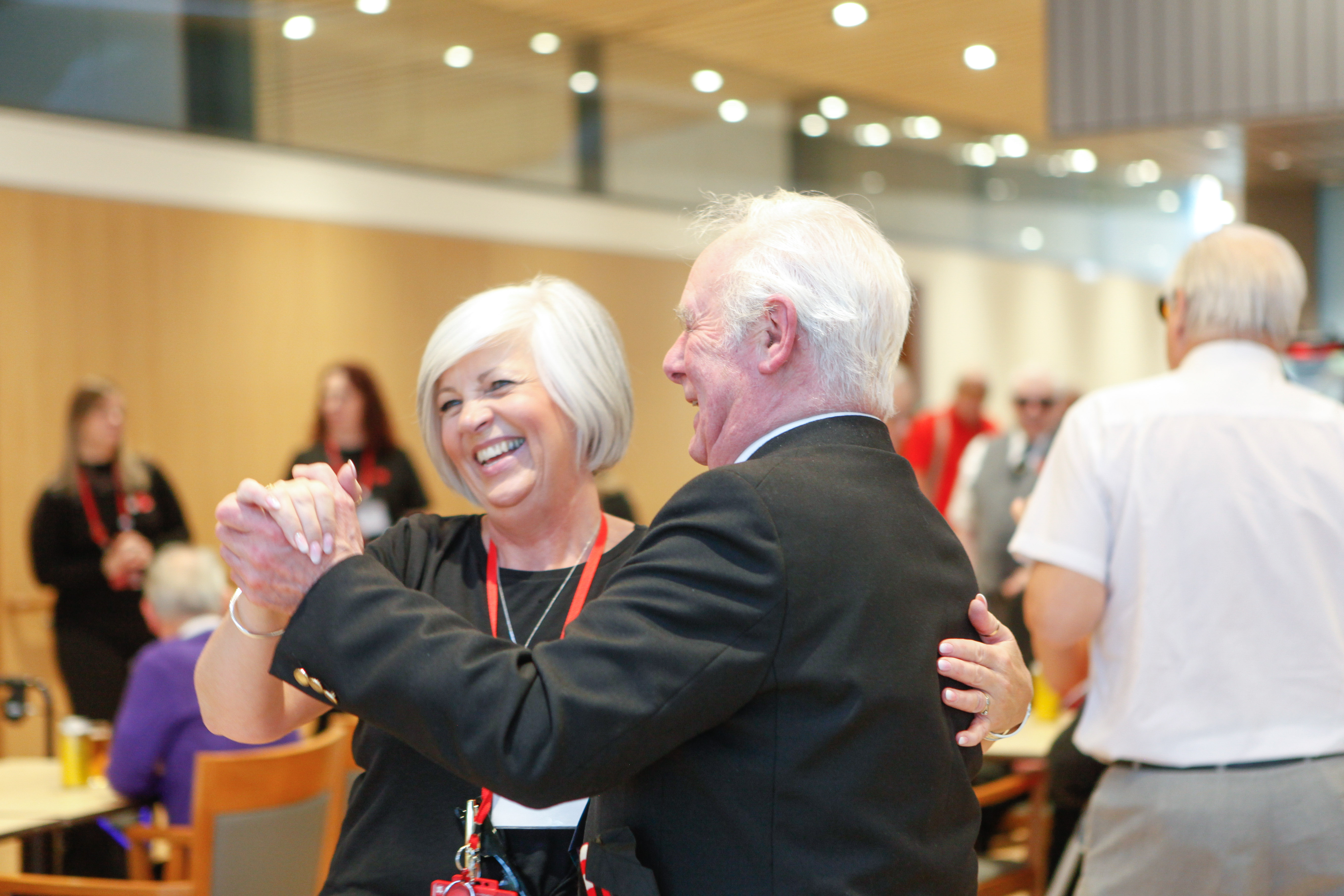 Veteran dances with member of staff at Hawkhead Centre