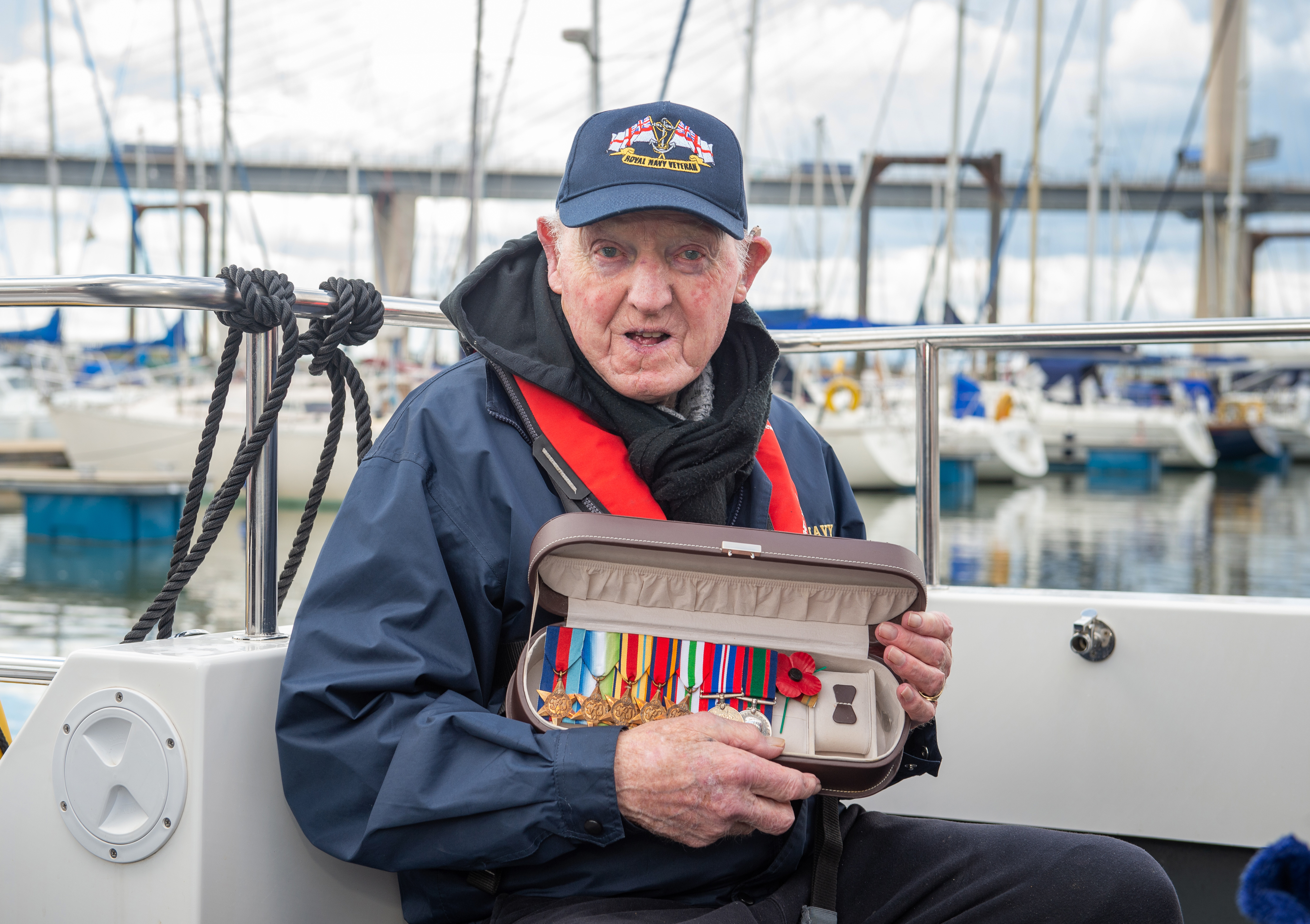 Veteran Harry Hogg with WWII medals