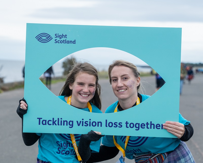 A couple of keen Kiltwalkers who raised money for Sight Scotland