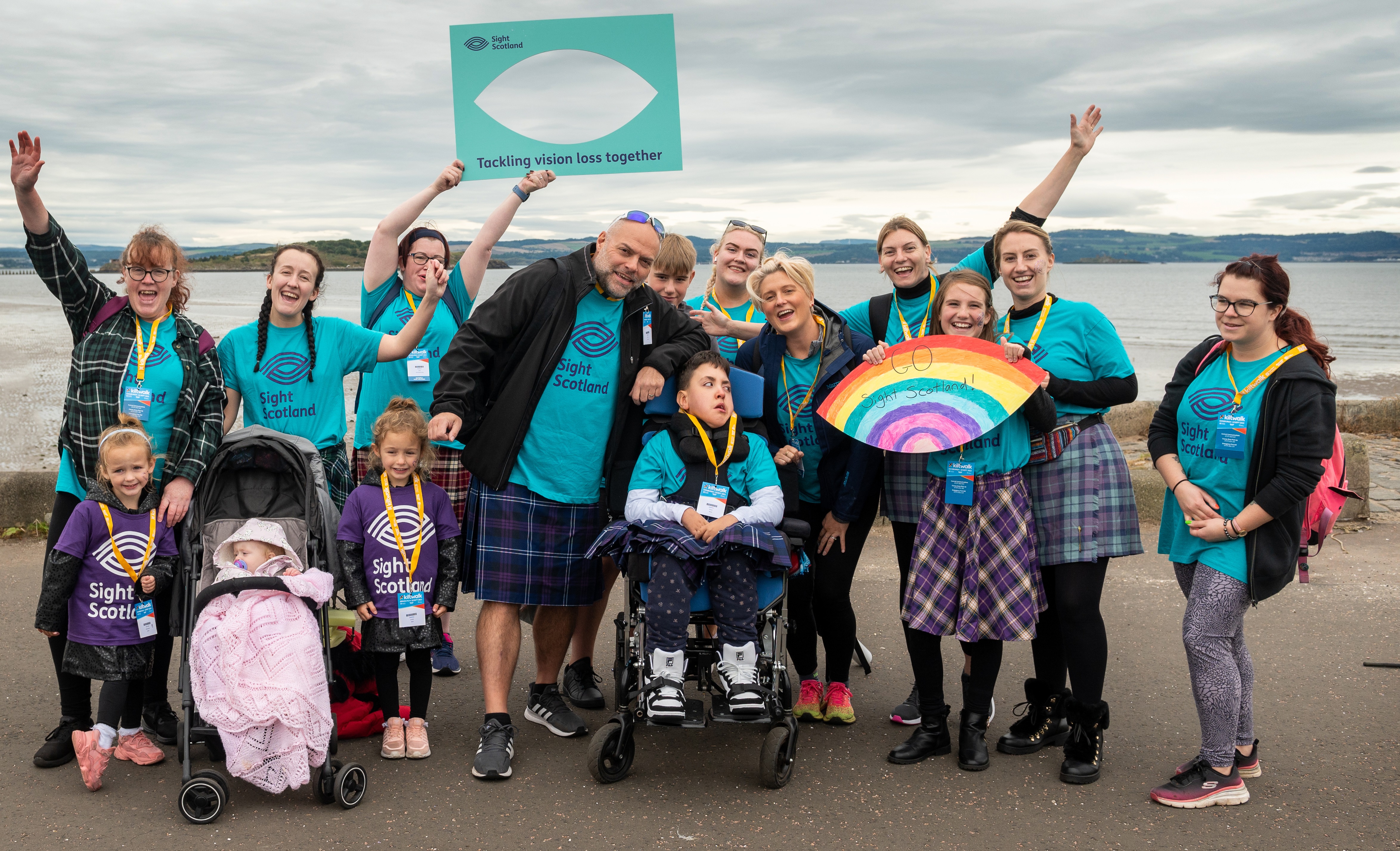 Edinburgh fundraisers on the beach at the start of the Kiltwalk