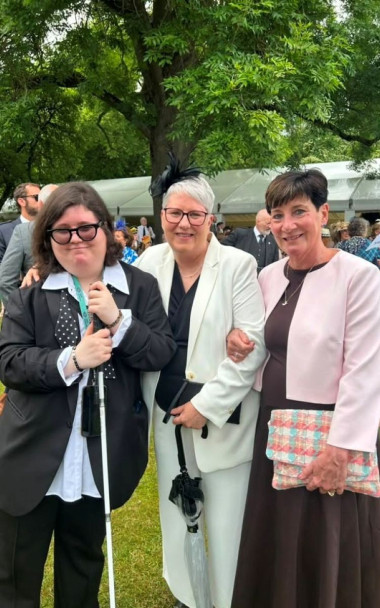 Jemima and Pam stand alongside Jemima's Mum, Jayne, in the gardens outside.