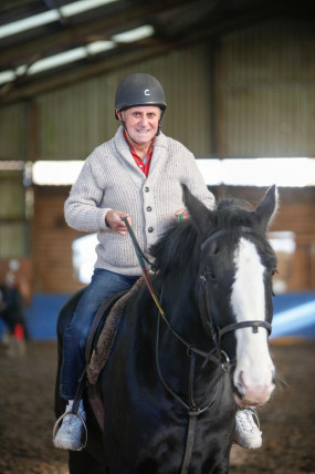 Veteran Stewart Campbell riding a horse