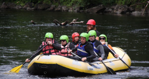 Veterans with sight loss enjoy white water rafting activity