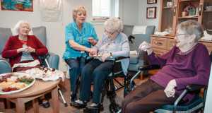 Jenny's Well residents catch up over cake and afternoon tea