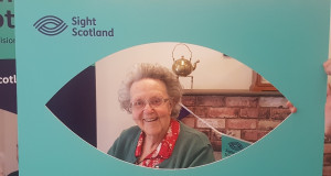 Jeannette with Sight Scotland sign