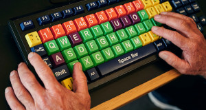 Veterans use accessible keyboards at Linburn centre