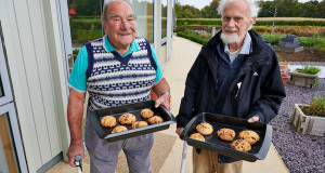 Veterans with the chocolate chip biscuits they baked at the Linburn centre.