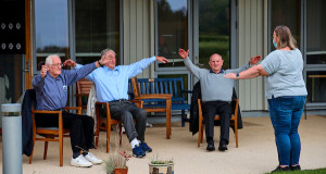 Veterans stretch in an exercise session at the Linburn centre
