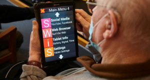 Veteran using large text tablet