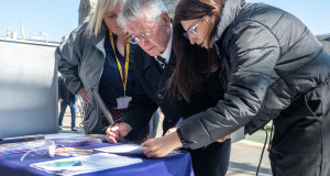 People signing the sight scotland fair rail vision petitions