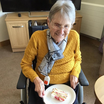 z_Care%20home%20resident%20Hannah%20McGregor%20enjoys%20some%20cake%2C%20donated%20by%20catering%20company%20Brakes.jpg